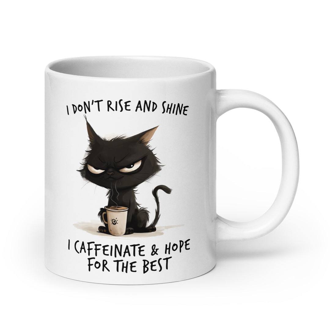 Funny Satire Coffee Mug featuring a grumpy cat with the quote I don't rise and shine, I caffeinate and hope for the best
