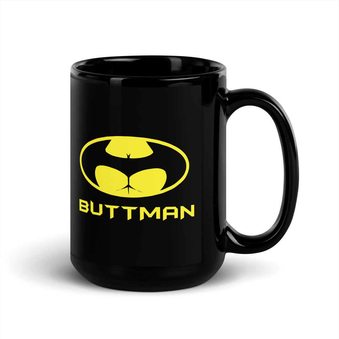 Black Funny Satire Coffee Mug featuring a whimsical 'BUTTMAN' logo design