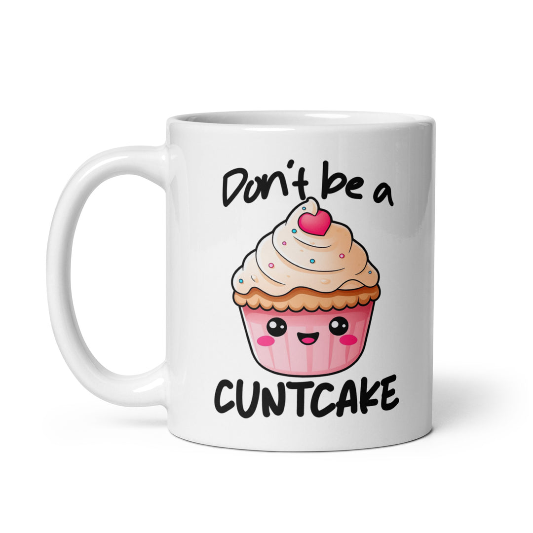 Funny Satire Coffee Mug featuring a cute cupcake with the phrase Don't be a CUNTCAKE