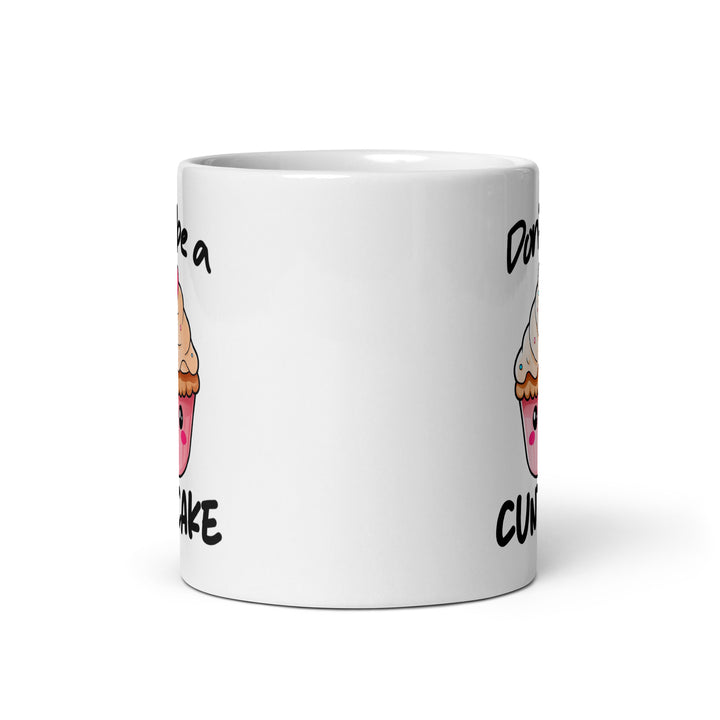 Funny Satire Coffee Mug featuring a whimsical cupcake design and humorous text