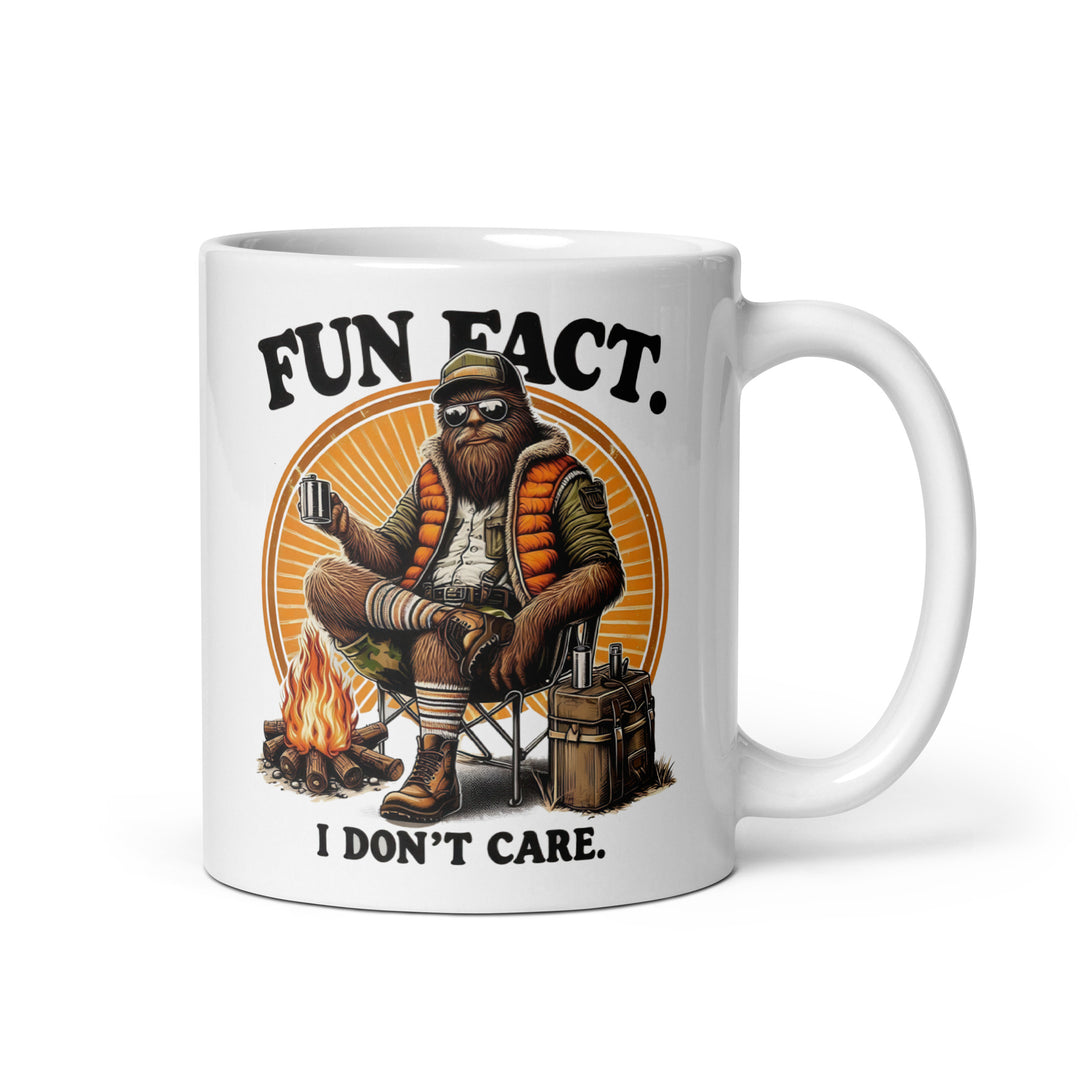 Funny Satire Coffee Mug featuring a relaxed character by a campfire with the text Fun Fact I Don't Care