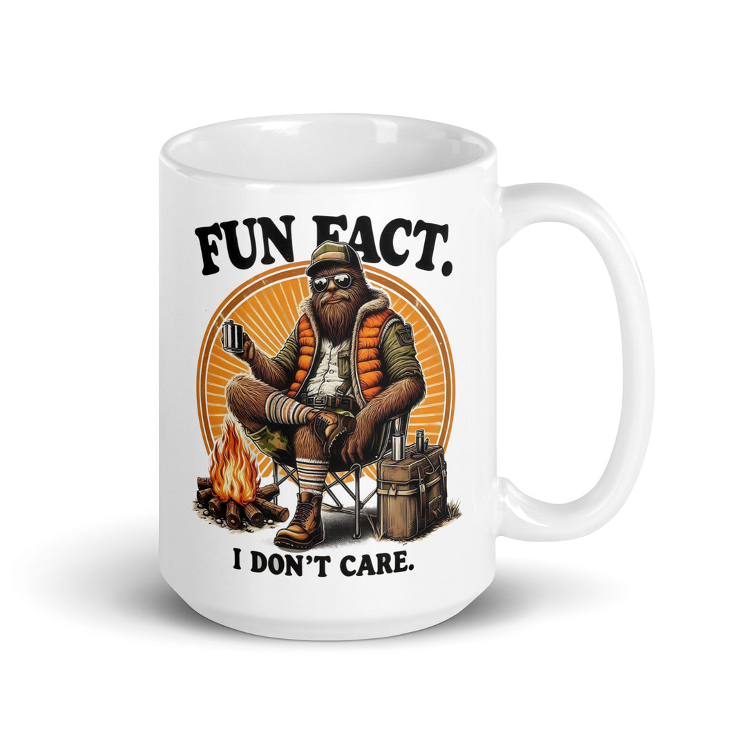 Funny Satire Coffee Mug featuring a relaxed bear with a campfire and the text Fun Fact. I don't care.
