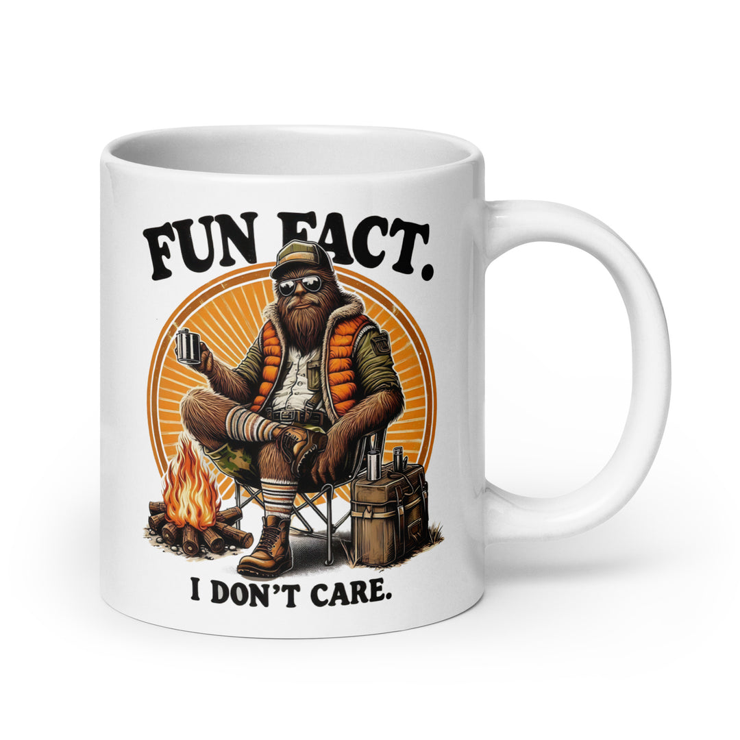 Funny Satire Coffee Mug featuring a relaxed character with a campfire and the text Fun Fact I Don't Care