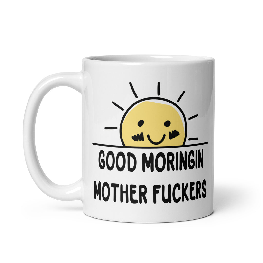 Funny Satire Coffee Mug with a smiley sun design and humorous text saying Good Moringin Mother Fuckers