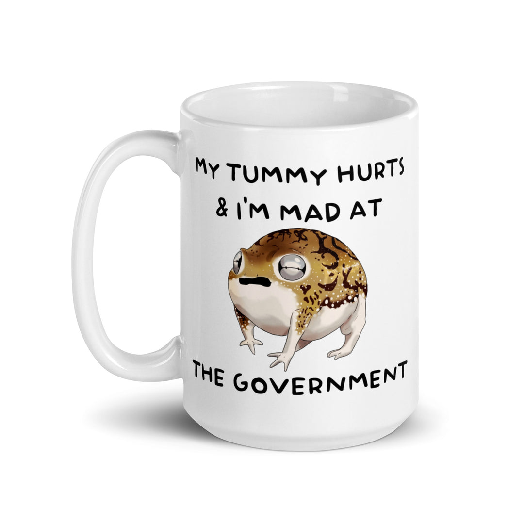 Funny Satire Coffee Mug featuring a frog with the text My Tummy Hurts & I'm Mad at the Government