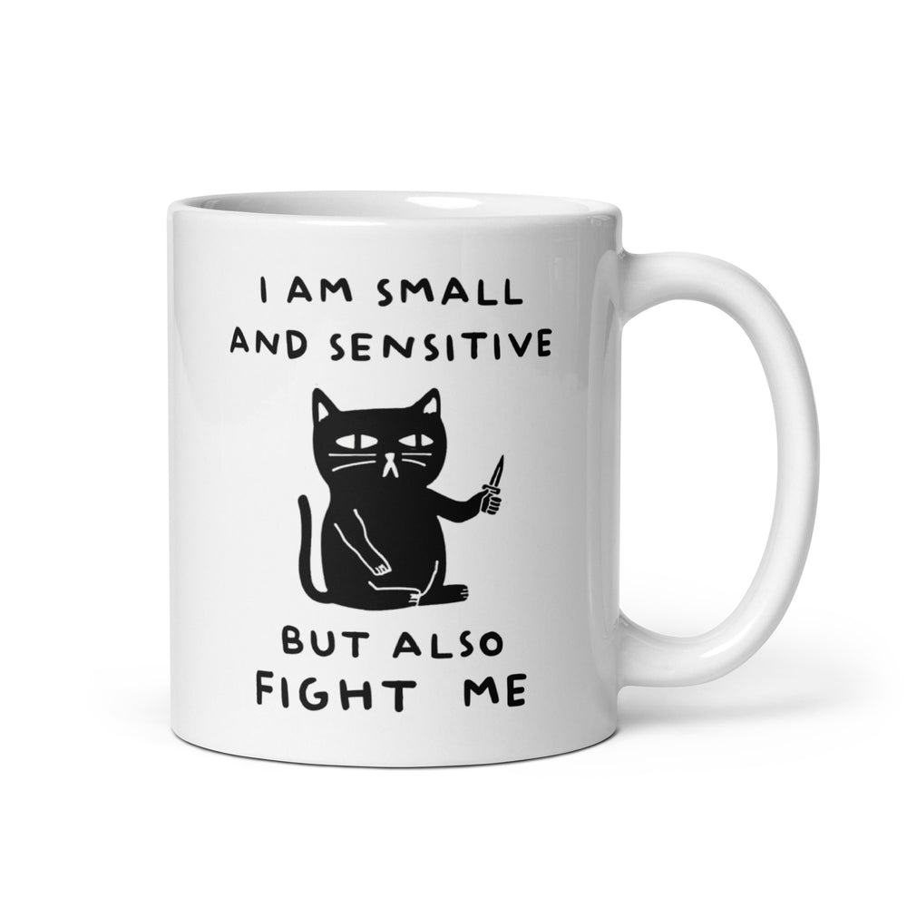 Funny Satire Coffee Mug featuring a small black cat with text saying I am small and sensitive but also fight me