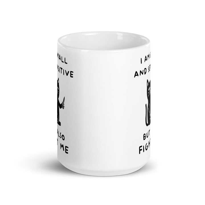 Funny Satire Coffee Mug featuring a black cat with humorous text about positivity and fighting