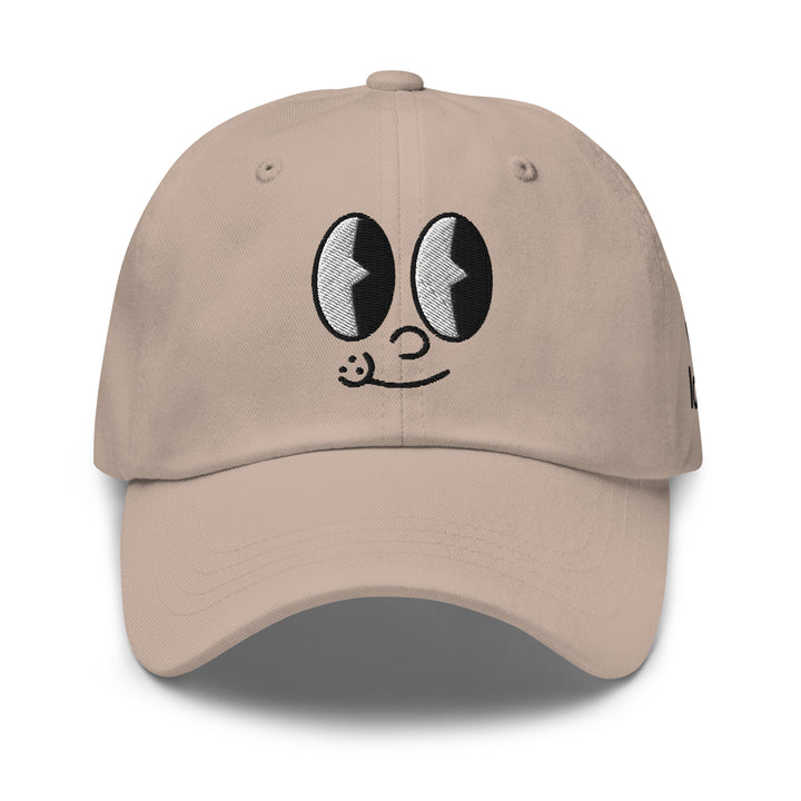 Fluid Identity Beige Cap featuring playful cartoon eyes for Urban Streetwear Apparel enthusiasts