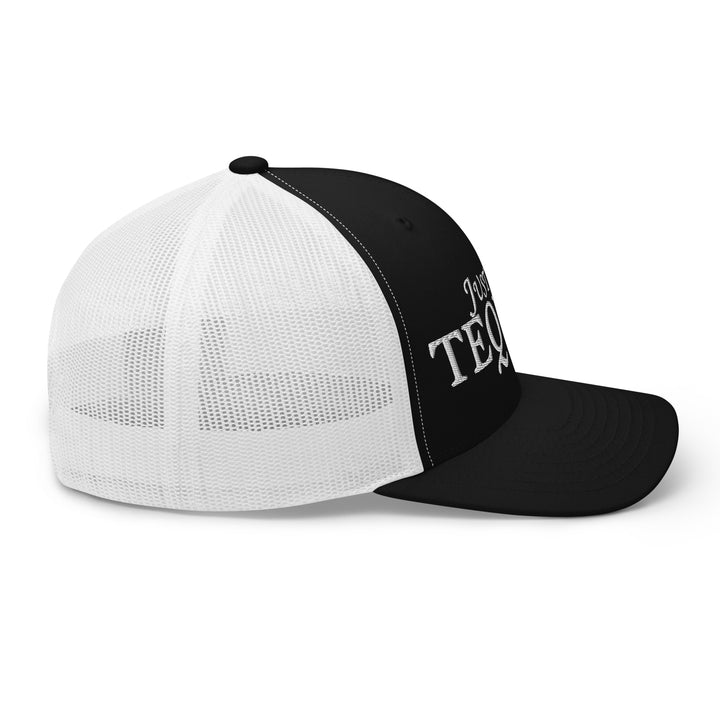 Black and white trucker cap featuring playful text, part of Urban Streetwear Apparel collection